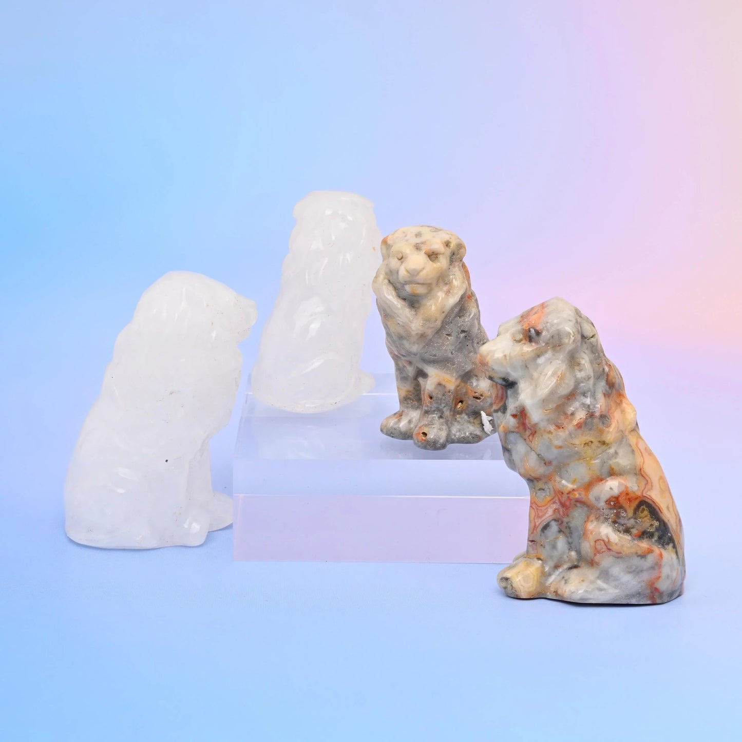 Lion Crystal Carving in rose quartz, tiger eye, amethyst and other natural stones.