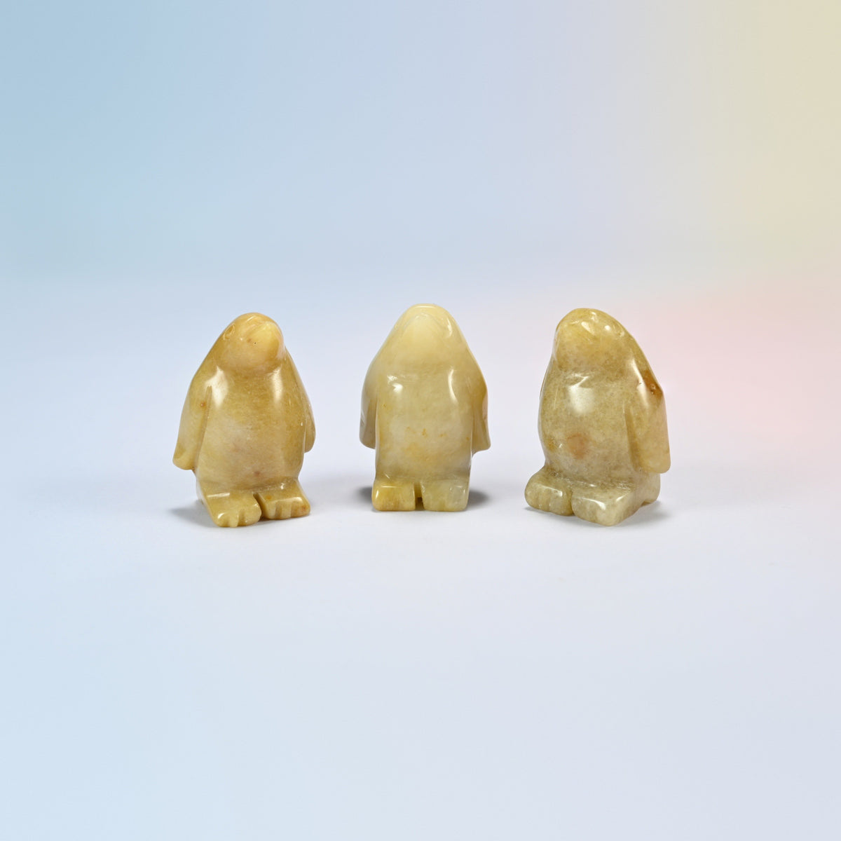 Three yellow jade penguin crystal carvings, 1.5 inch, honey yellow natural stone
