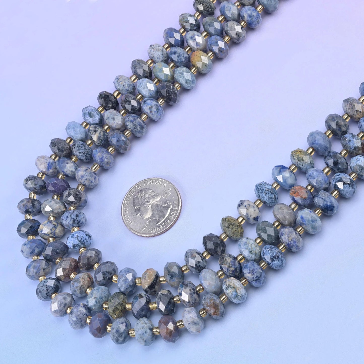 Sunset Dumortierite Faceted Rondelle Beads in denim blue and pale grey with rust-tan patches