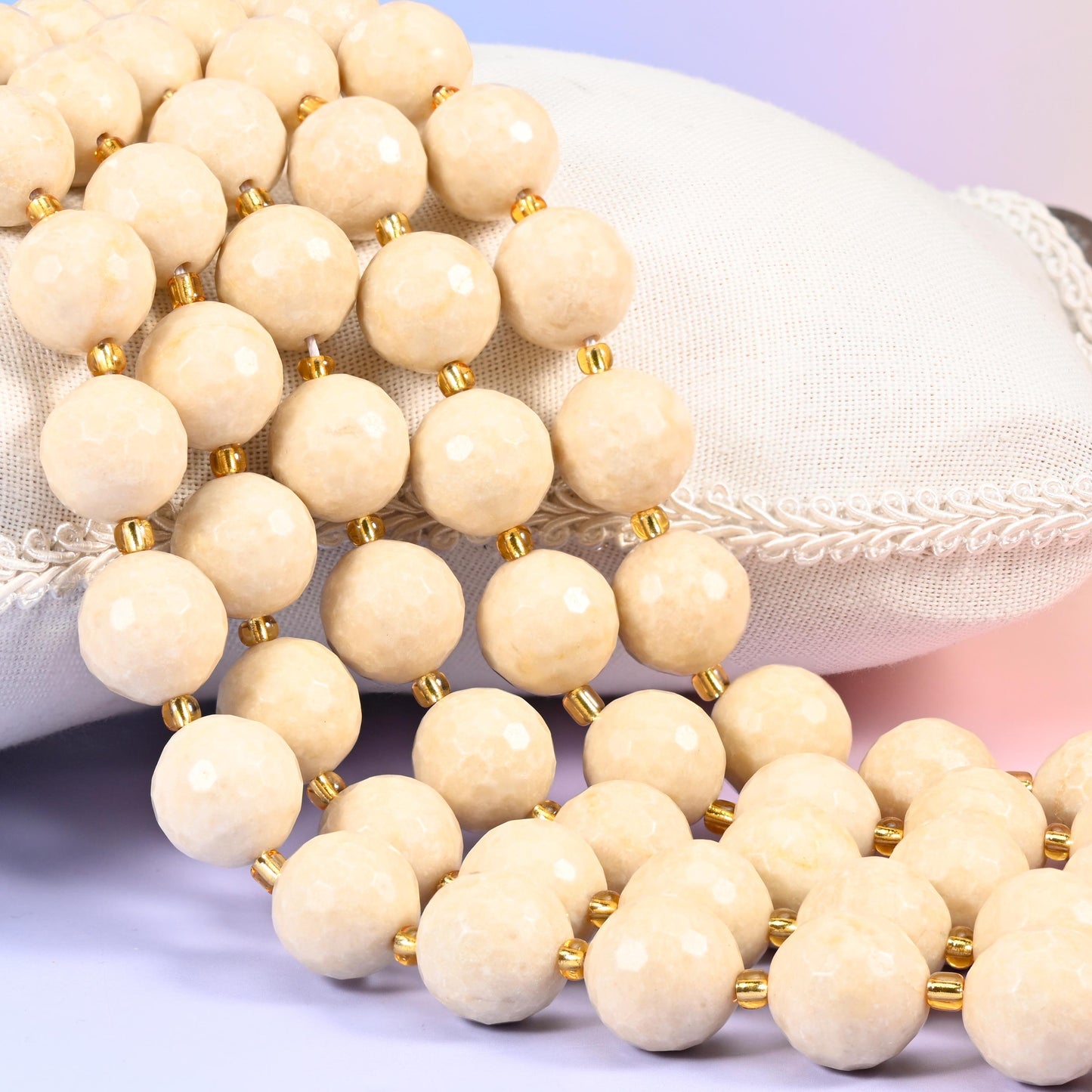 Fossil Jasper Faceted Round Beads, warm ivory and pale sand with fine dark speckling