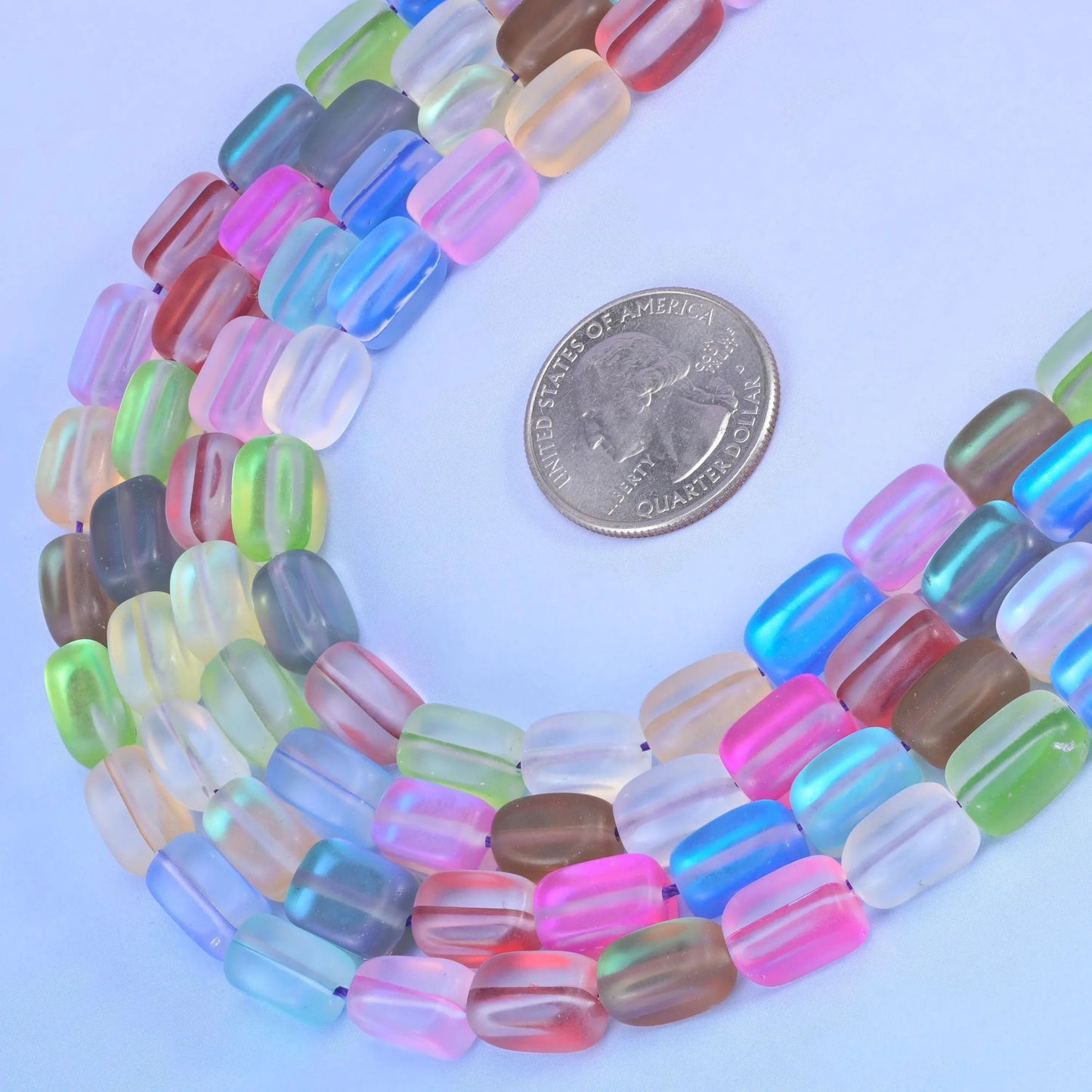 Rainbow Mystic Aura glass beads with a matte frosted finish and iridescent shine