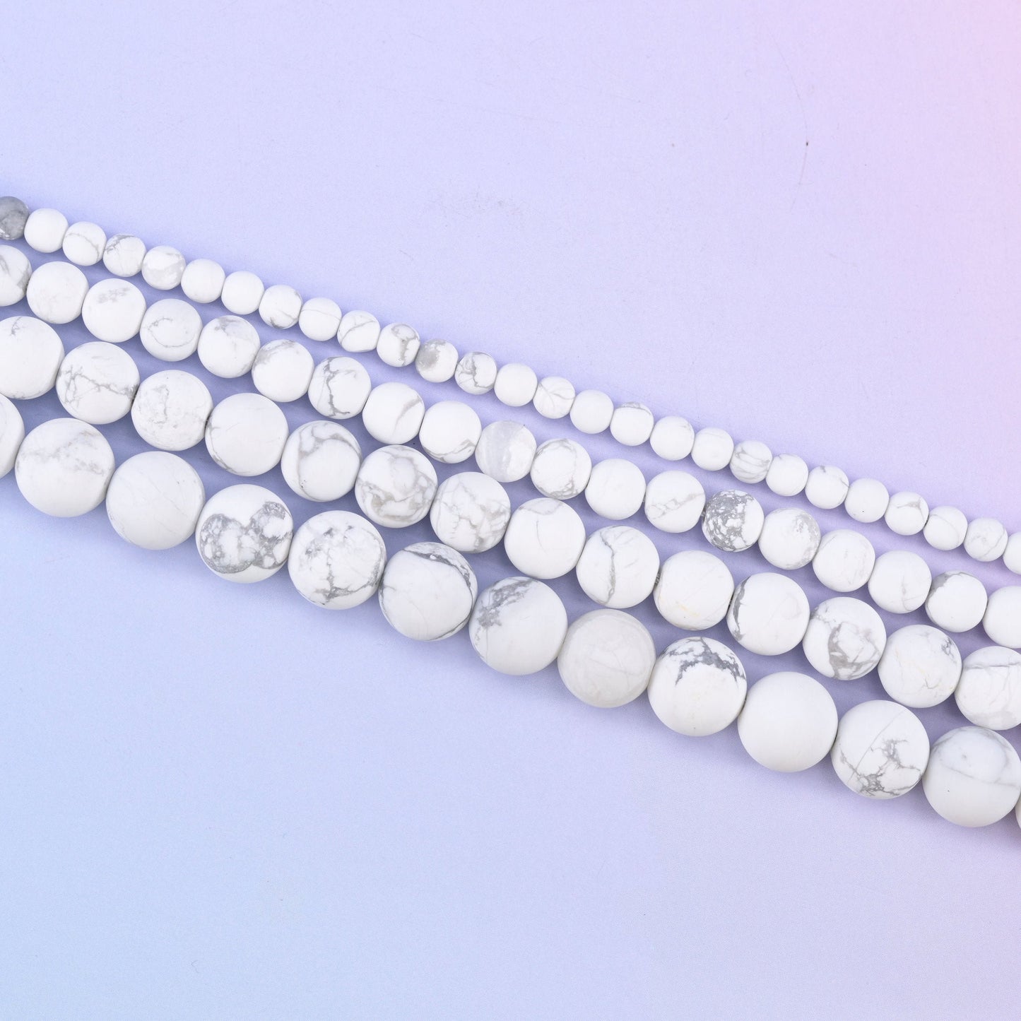 White howlite matte round beads in chalk white with fine grey marbled veining