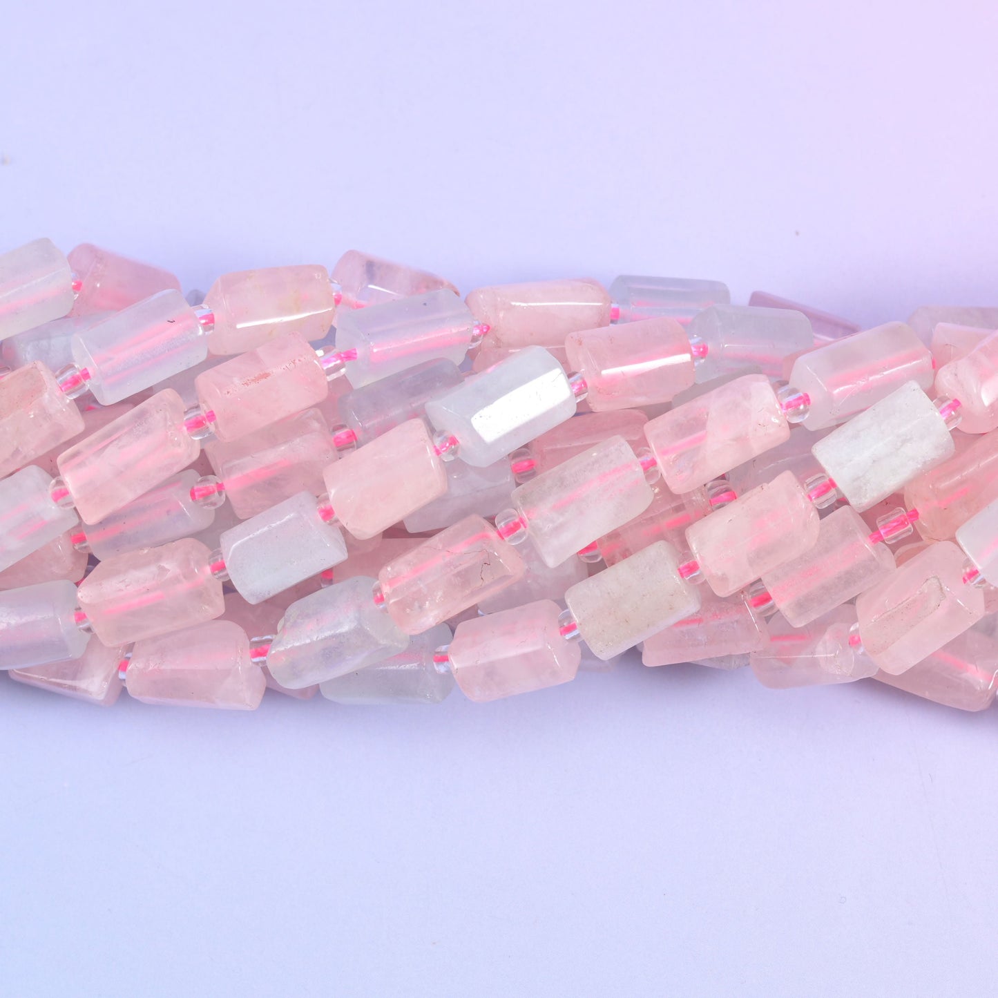 Faceted tube cut morganite beads.