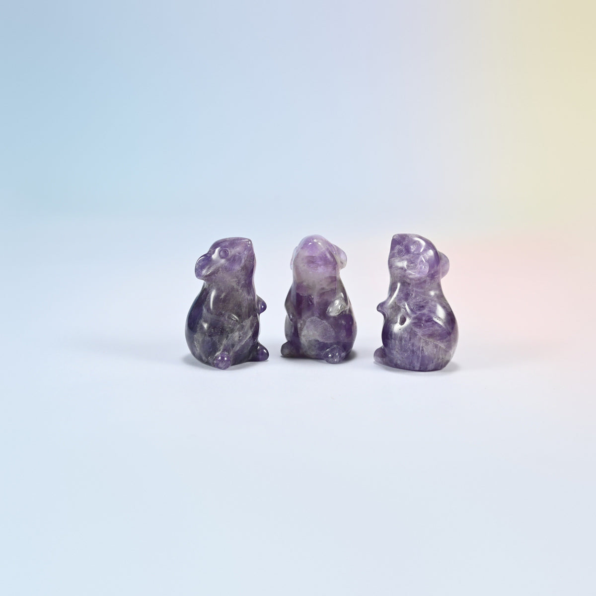 Three natural amethyst mouse crystal carvings, 1.5 inch, purple and white banded