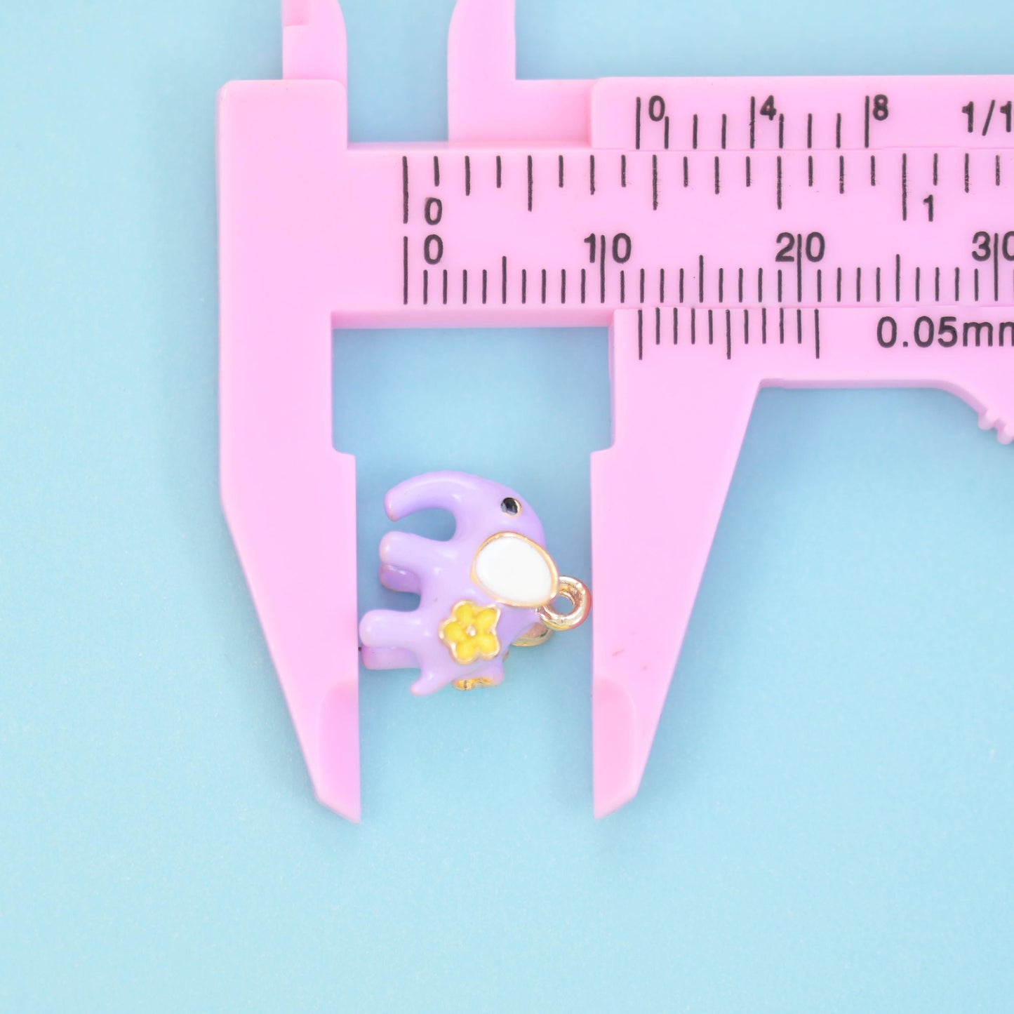 Enamel Elephant Charm 18K Gold Filled 11x11mm in purple or pink, with a white ear and a gold flower