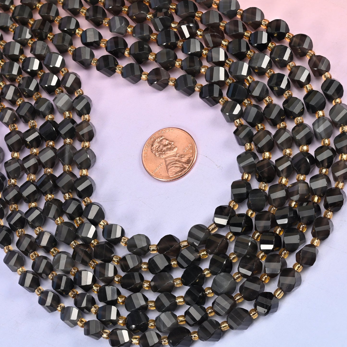 Ice obsidian natural stone beads, 8mm, clarity changing from solid black to see-through smoke across the strand
