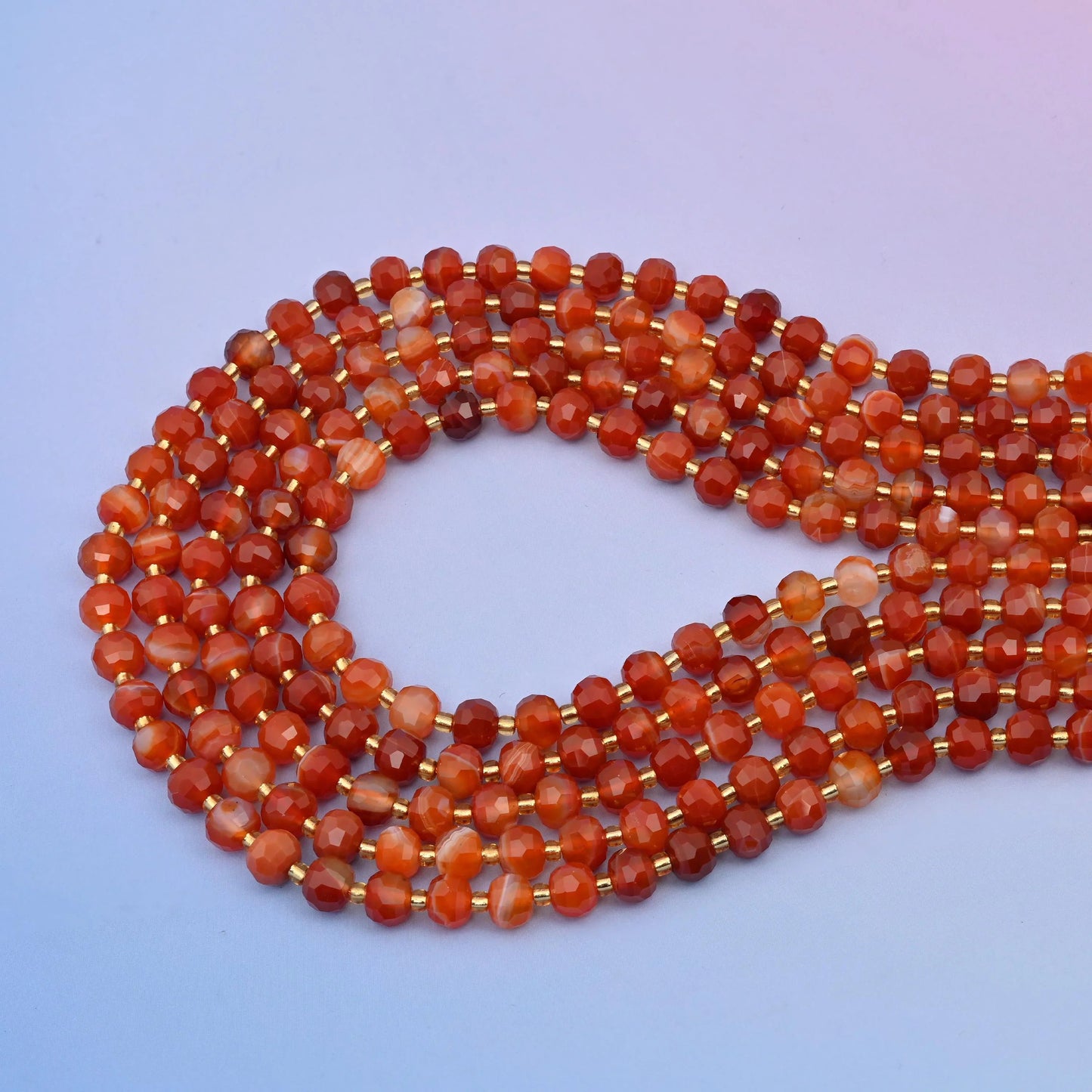 Red Strip Agate faceted rondelles, sold per 15.5 inch strand.