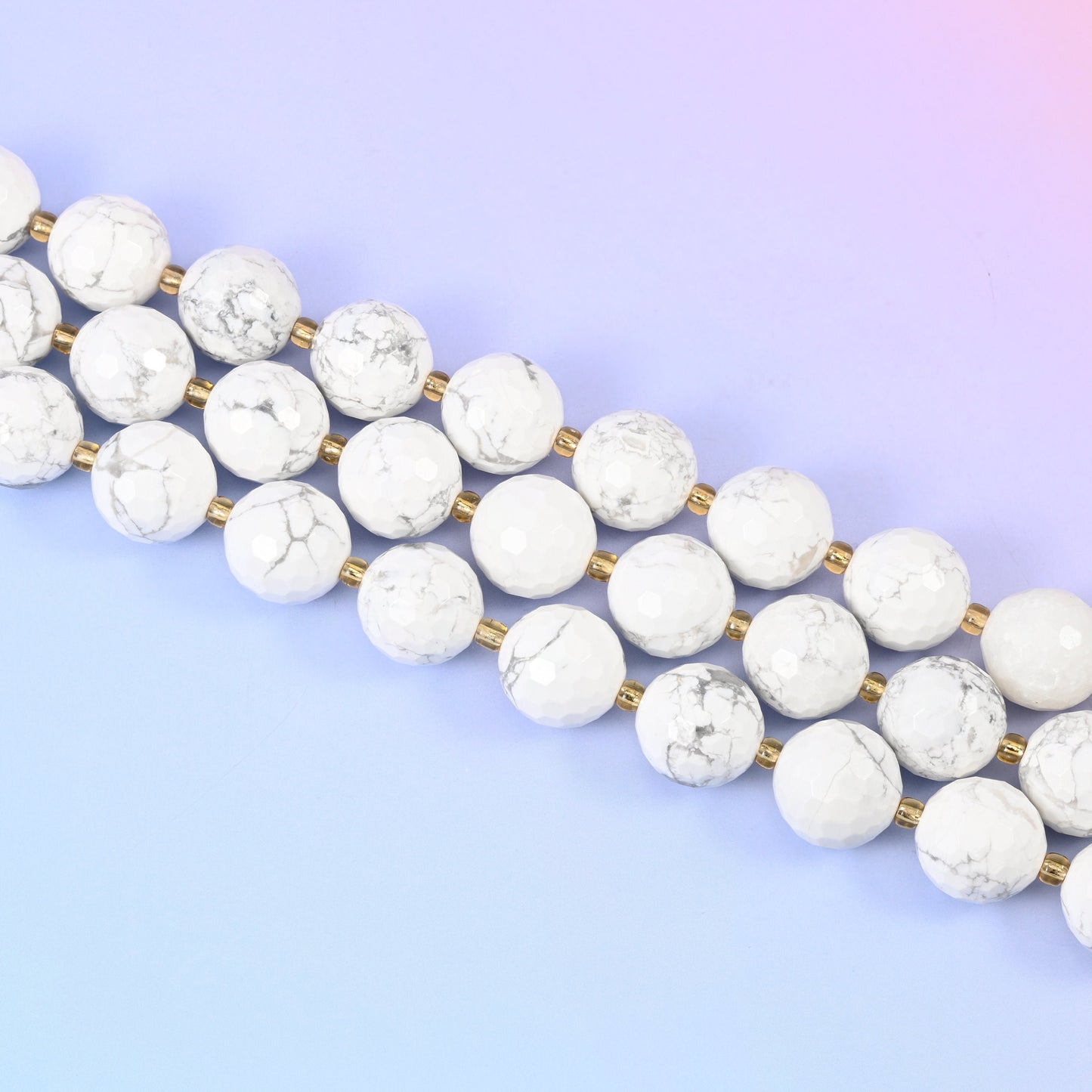 Faceted round cut white howlite beads