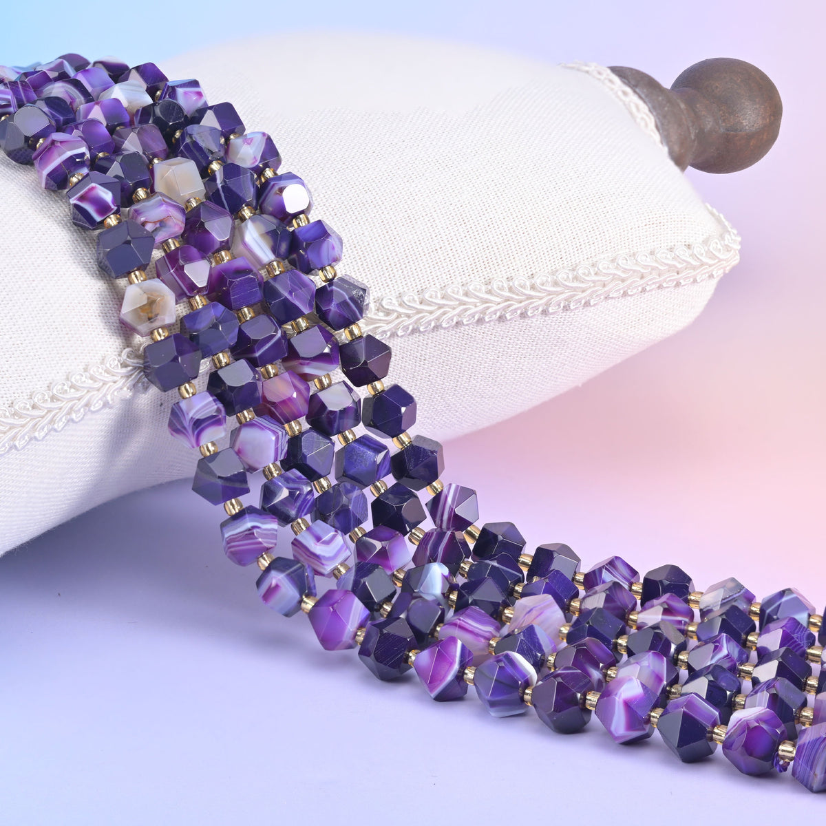 Faceted rhombus gemstone beads for drop earrings and beaded chain links.
