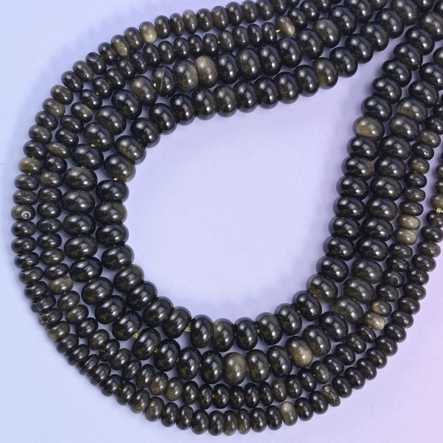 Gold Obsidian rondelle beads, approximately 90 beads per strand