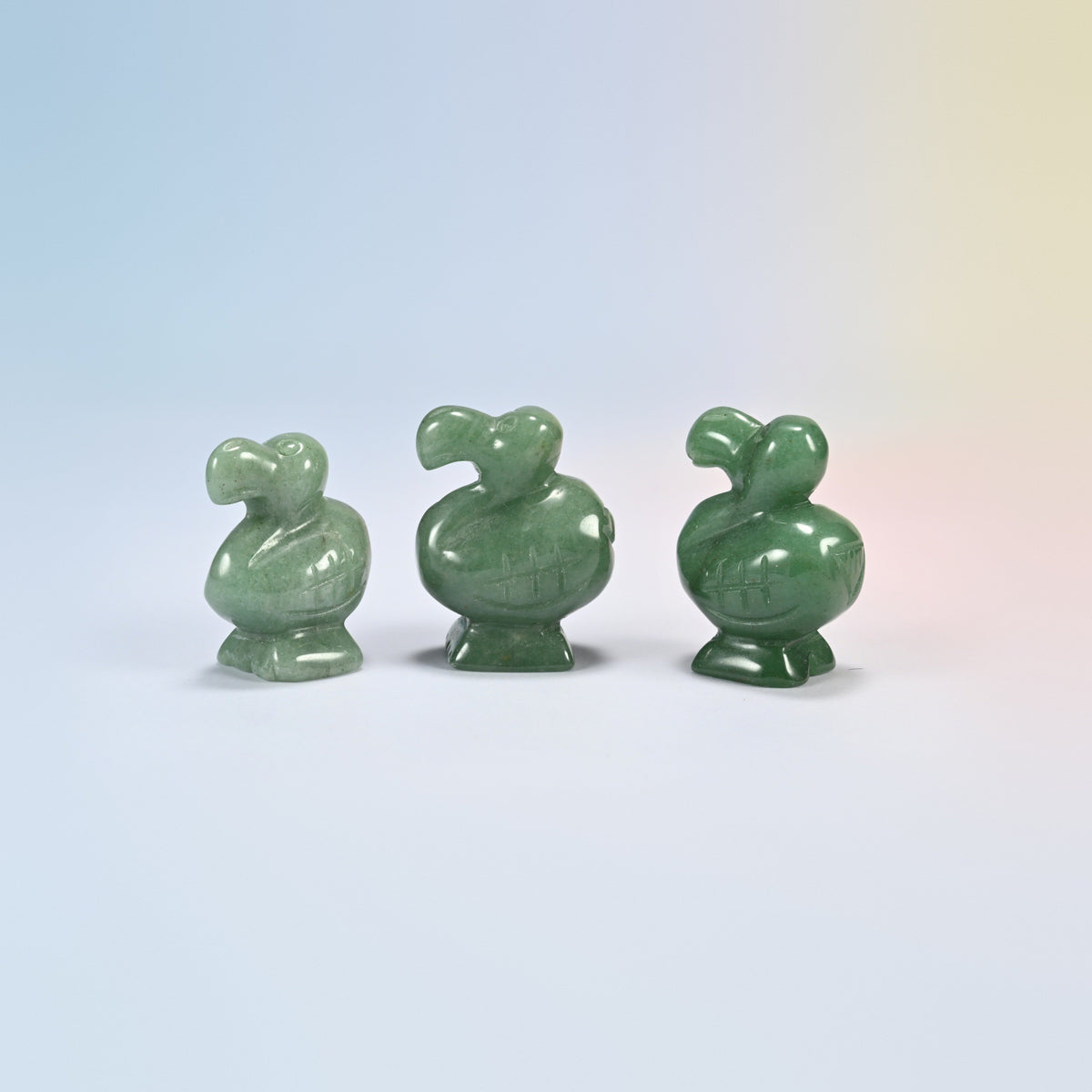Three green aventurine dodo bird crystal carvings, 1.5 inch, light to deep green natural stone