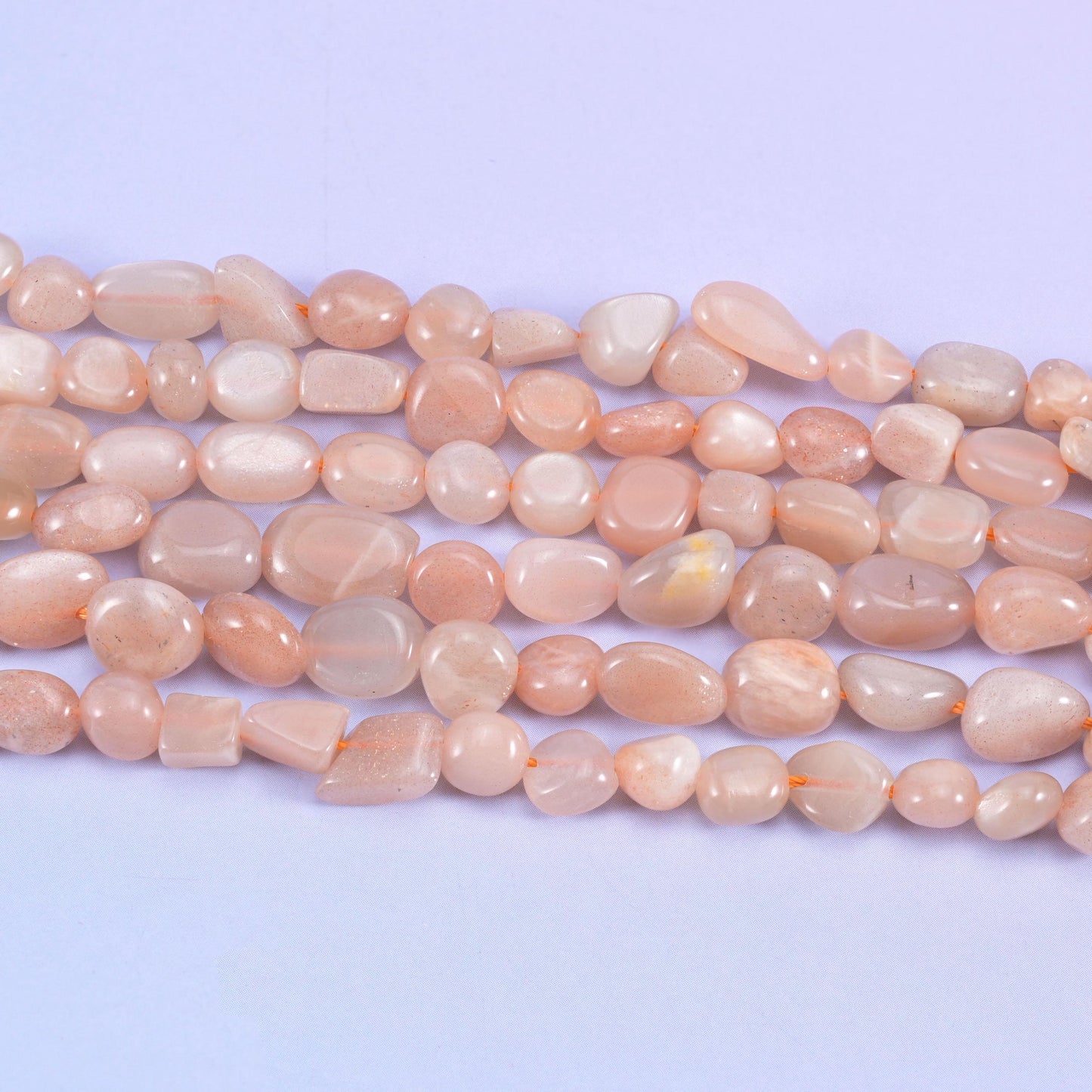 Peach moonstone pebble nugget beads, 15.5 inch strand