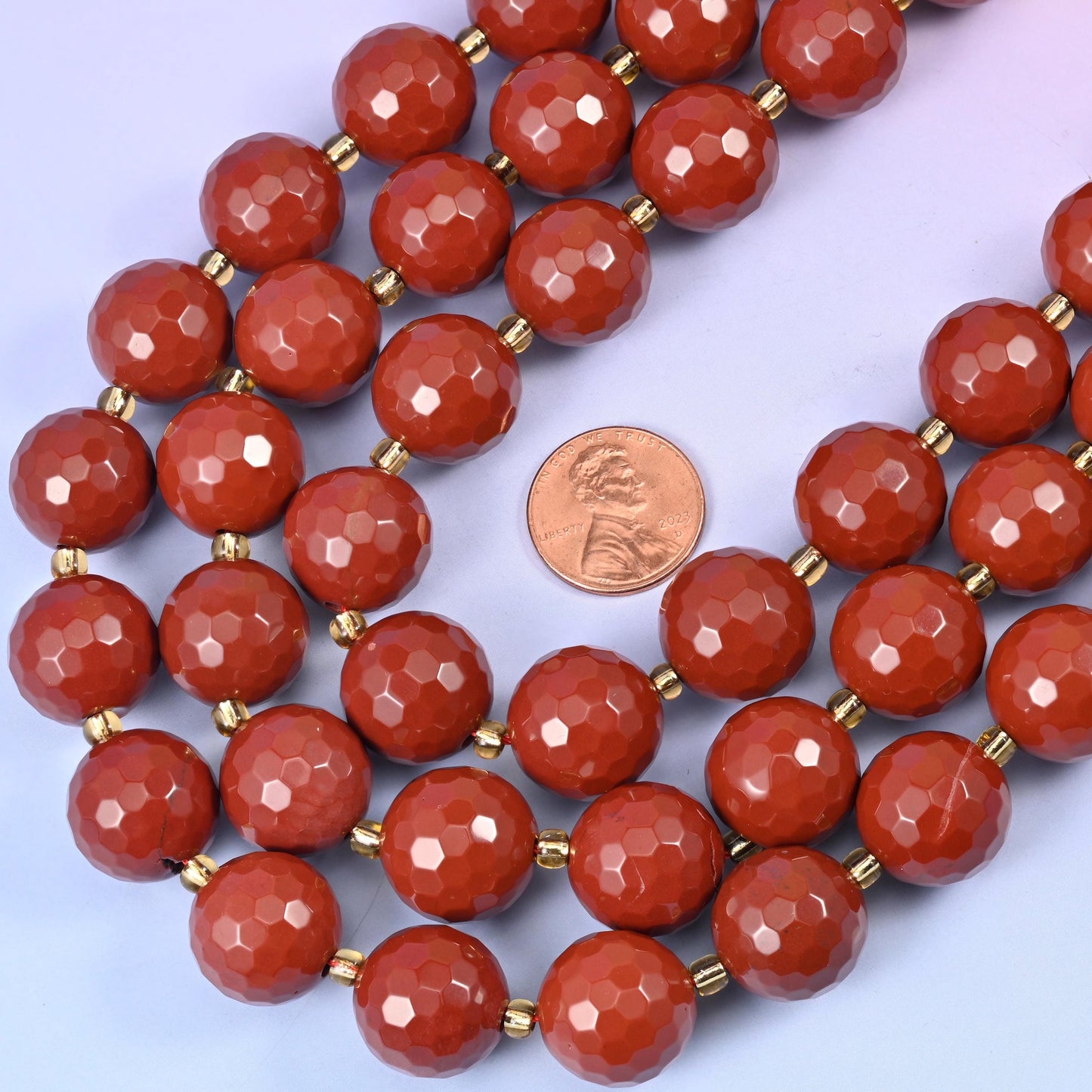 Red Jasper Faceted Round Beads, approximately 21 beads per strand