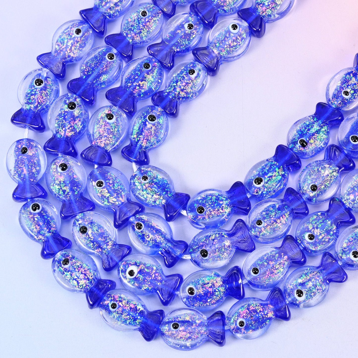 Iridescent Dark Blue Fish Glass Beads, 15.5 inch strand