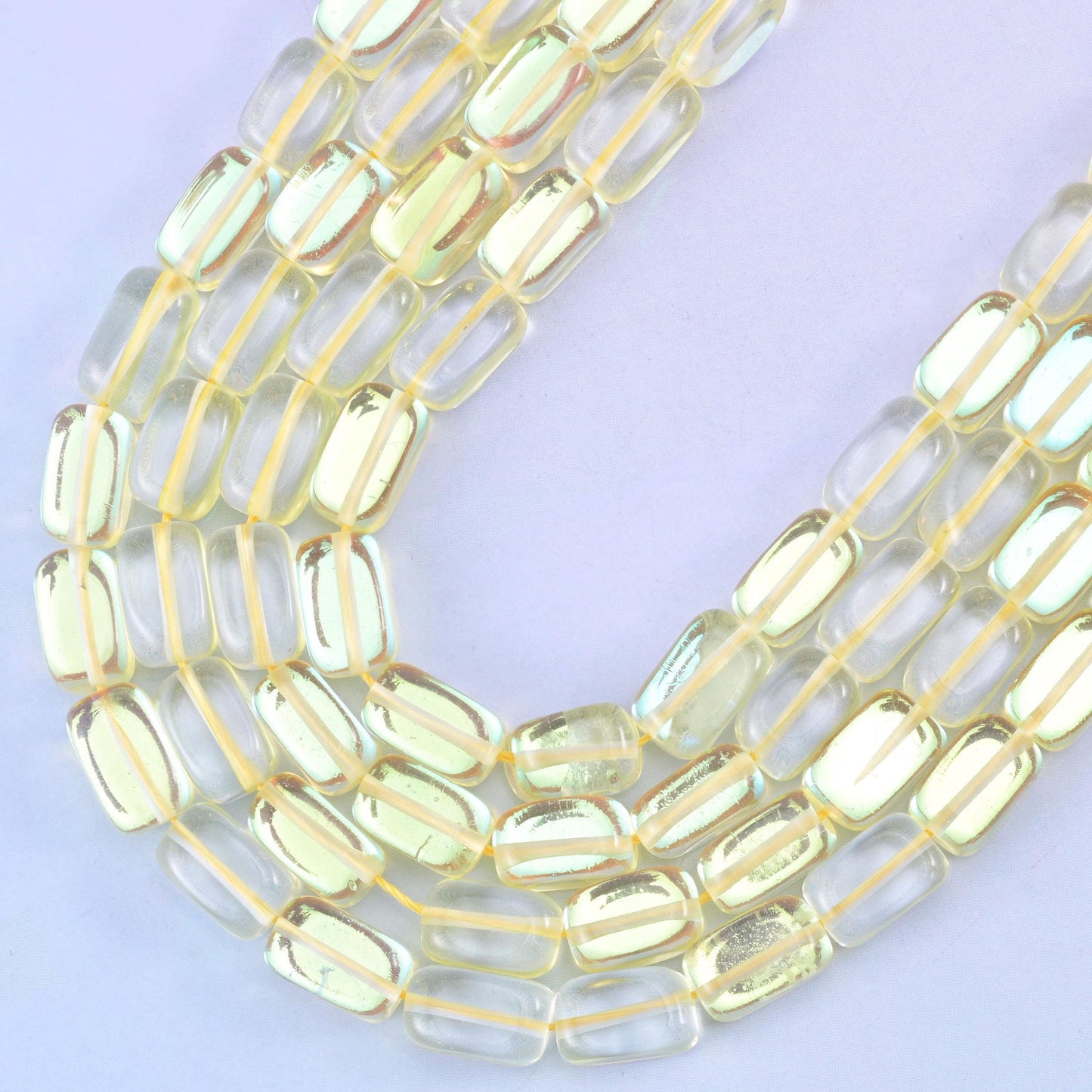 Yellow Mystic Aura glass beads, center-drilled approximately 1.0mm hole