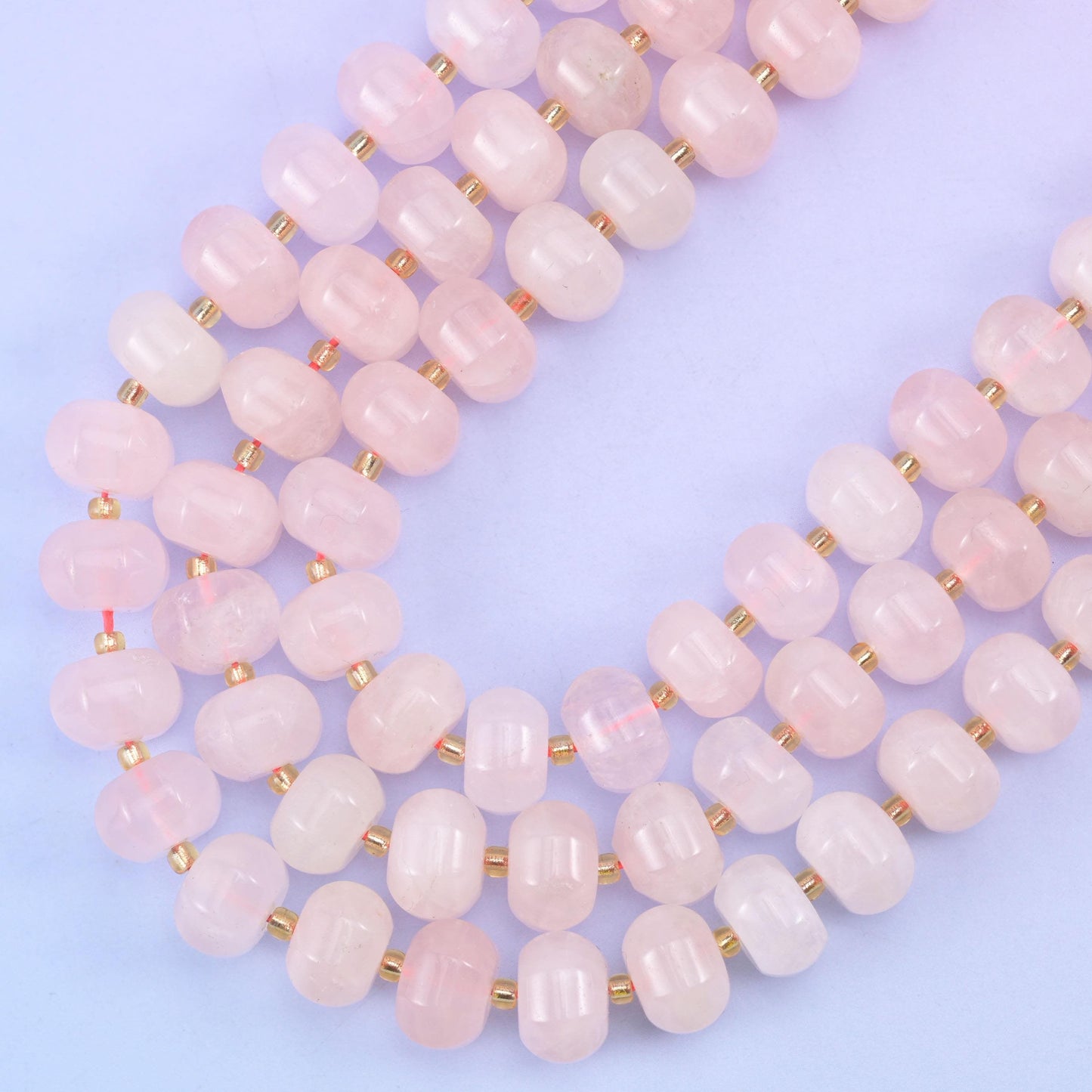 Rose quartz pumpkin beads, approximately 35 beads per strand