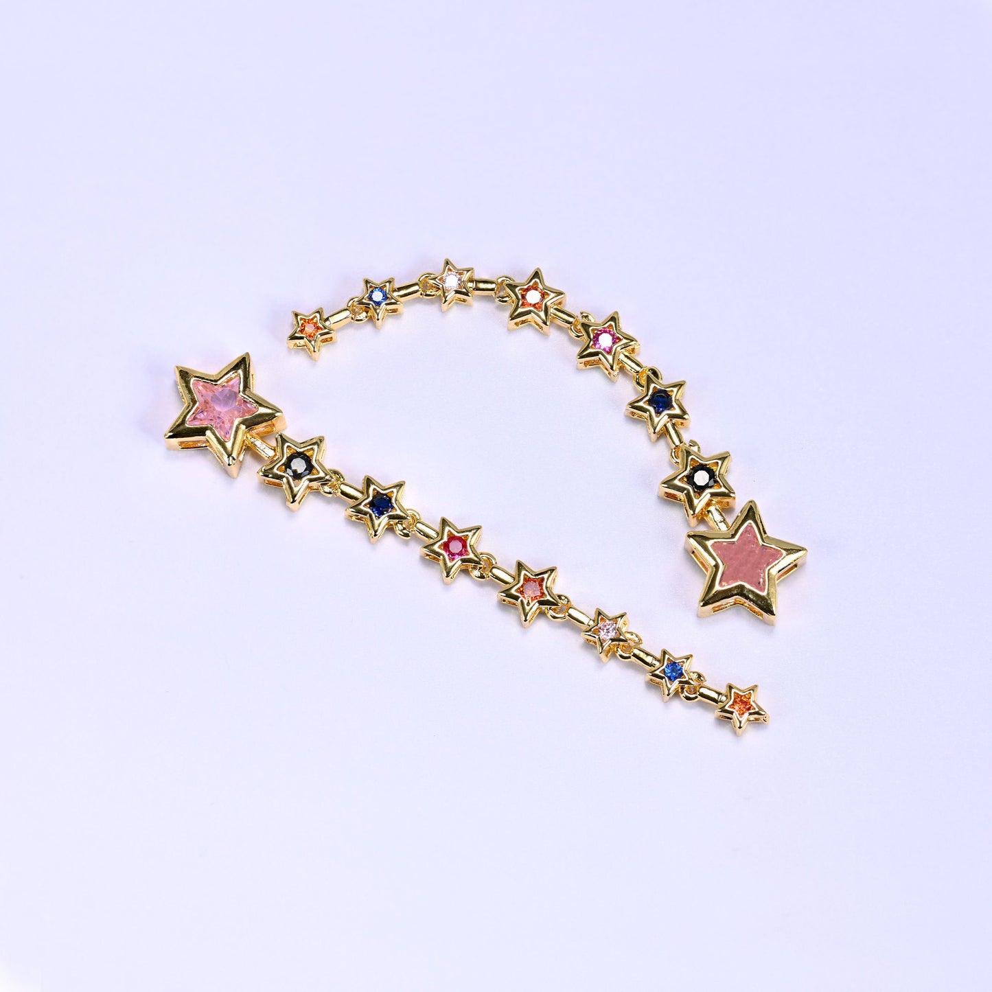 Bezel chain with a graduated row of star-shaped zircon stones