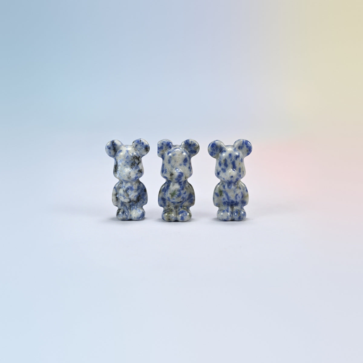 Three 1.5 inch blue spot jasper power bear crystal carvings, white natural stone with blue spots