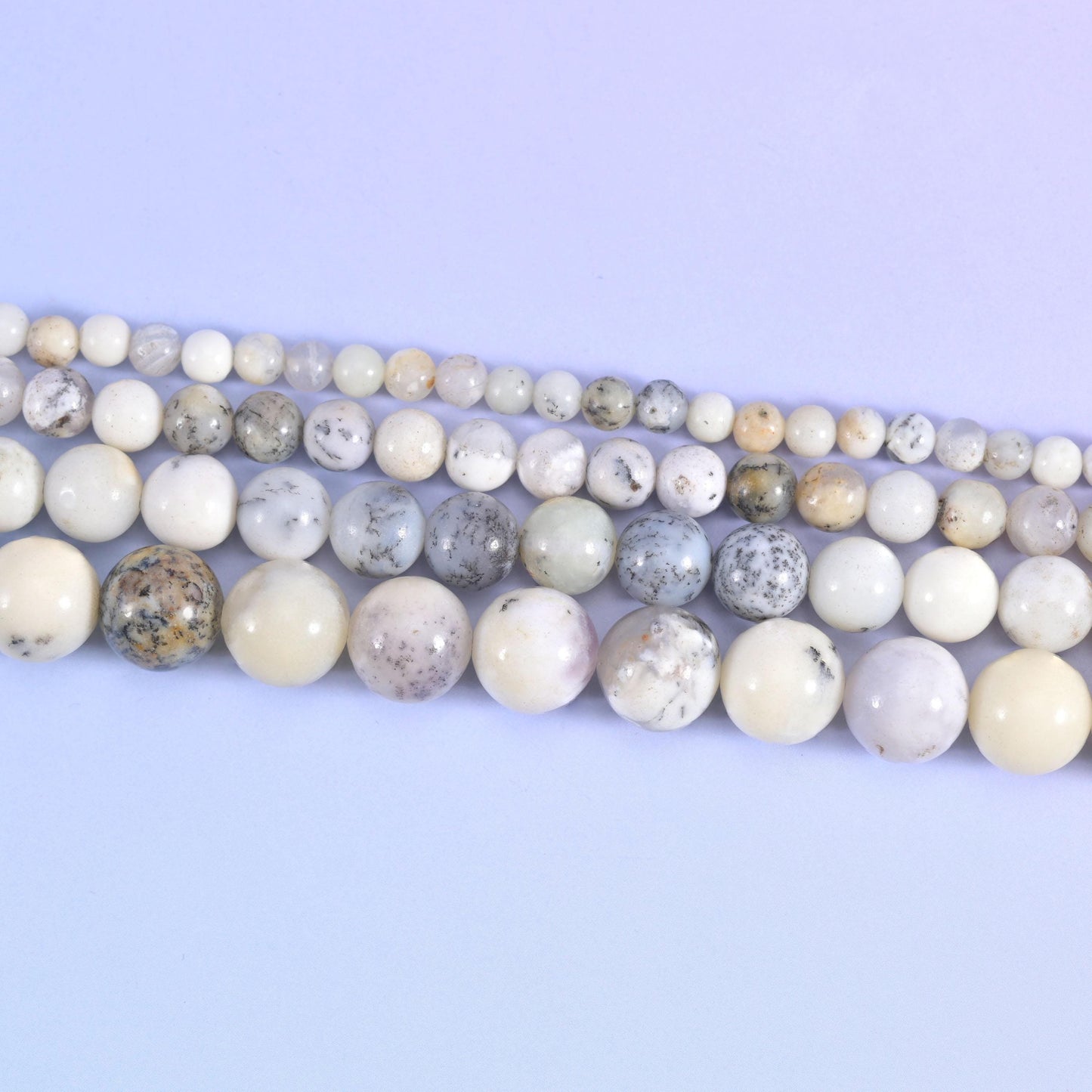 White opal round beads in creamy ivory and soft grey-white