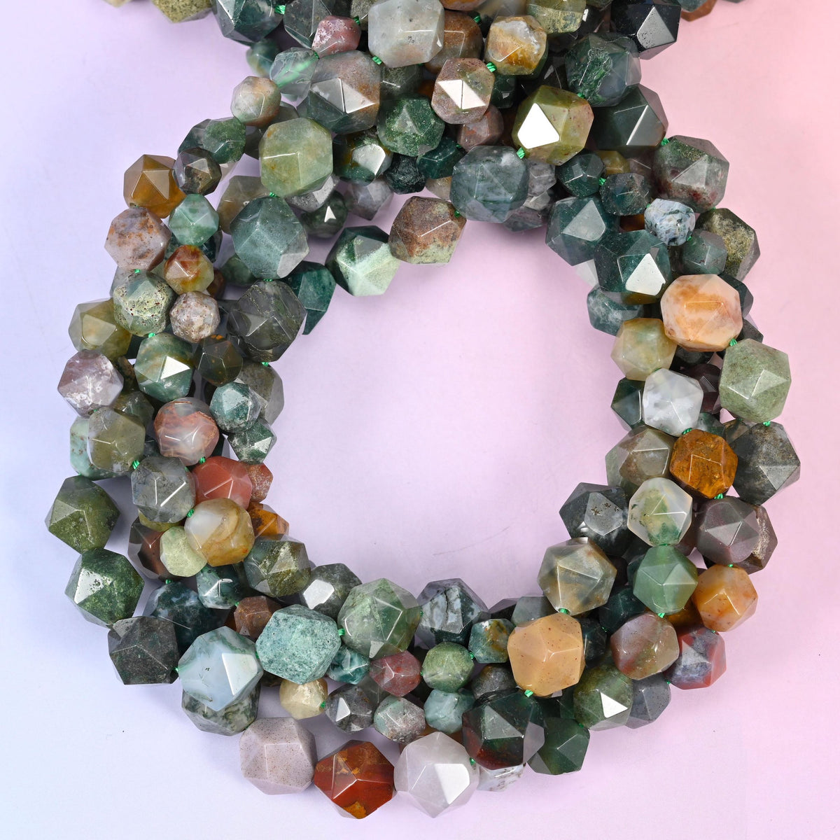 Indian Agate star cut beads coiled in a loop, approximately 38 beads per 10mm strand
