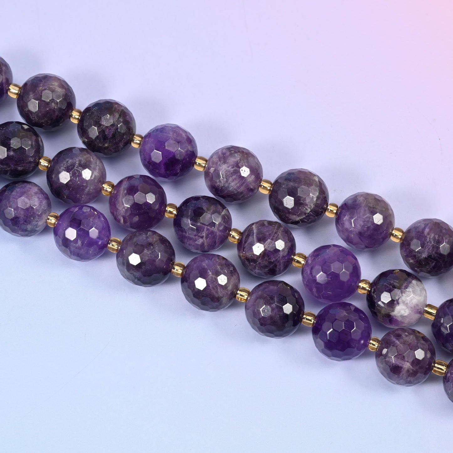 Faceted round cut amethyst beads