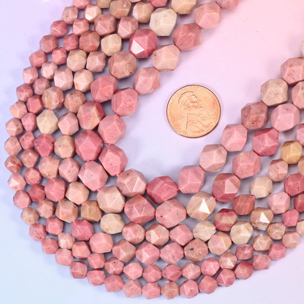 Diamond star cut Pink Rhodonite beads