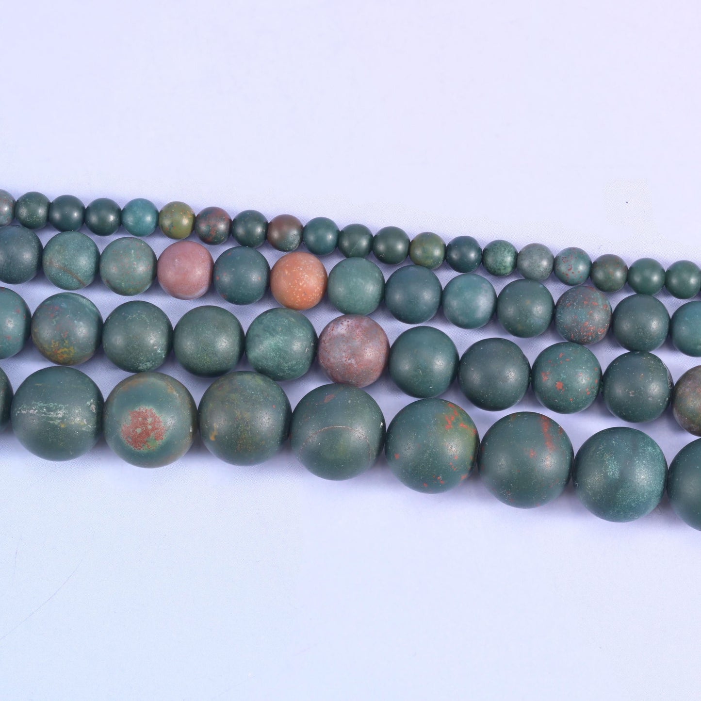 Oriental jasper round beads in deep pine and teal green