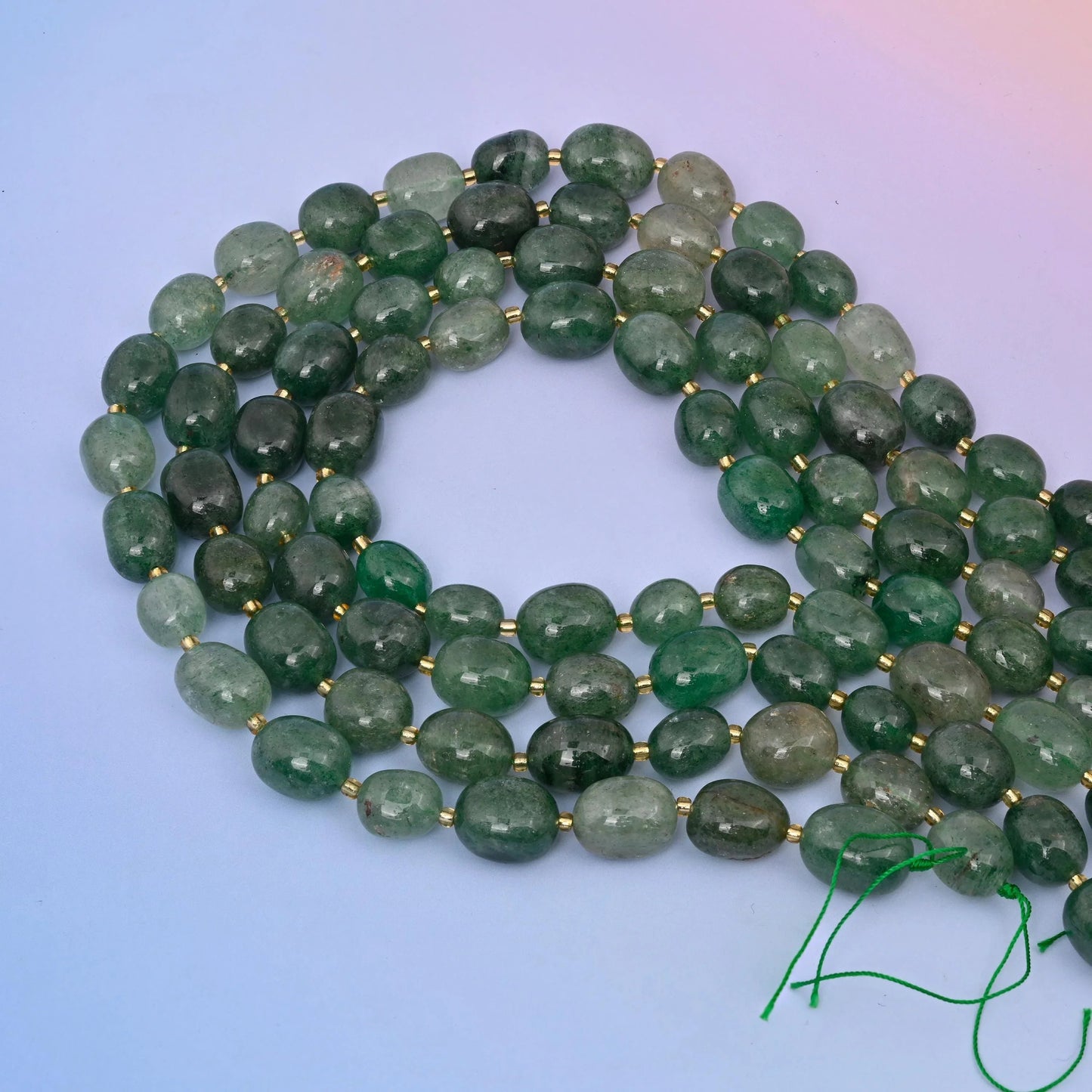 Green Strawberry Quartz in a range of natural green hues.