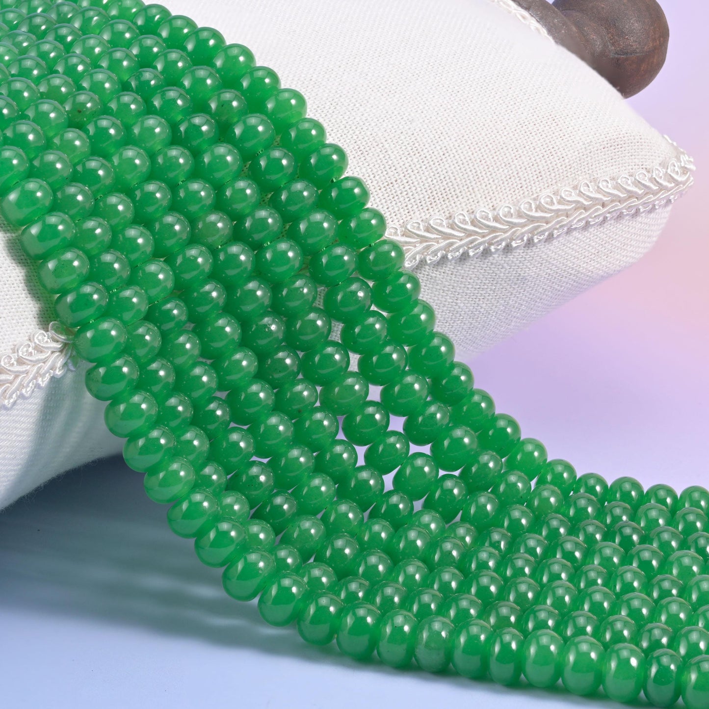 Green Dyed Jade smooth rondelle beads in a vivid emerald green