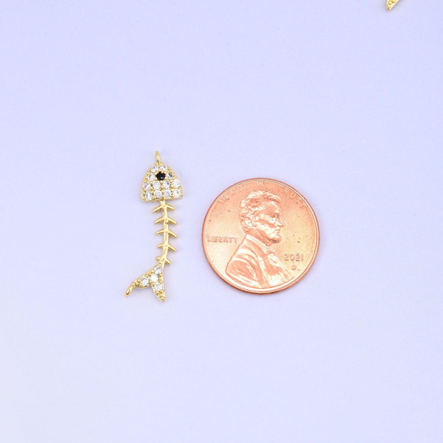 Fishbone Charm Pendant in gold and black