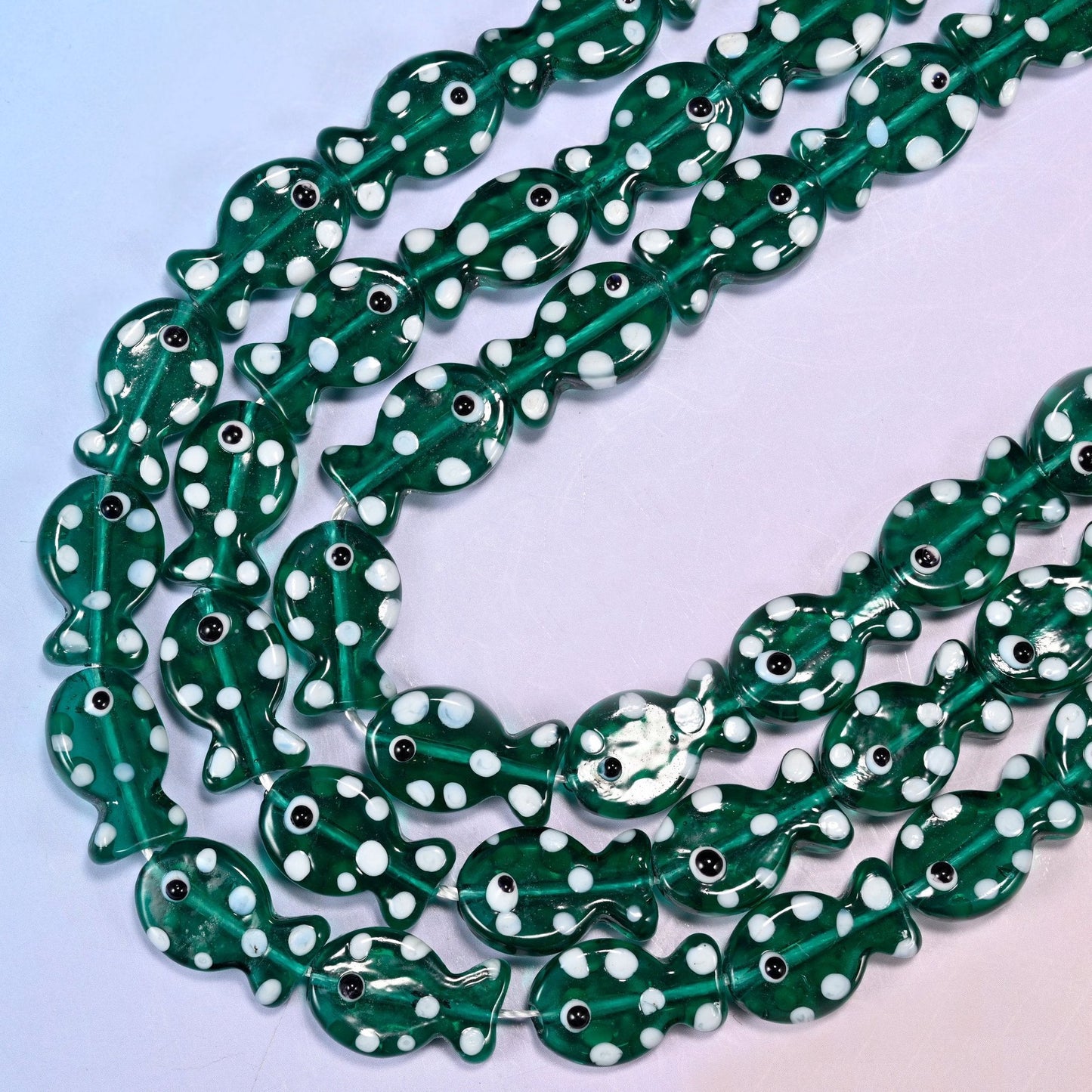 Transparent Jungle Green with White Dot Fish Glass Beads, 15.5 inch strand
