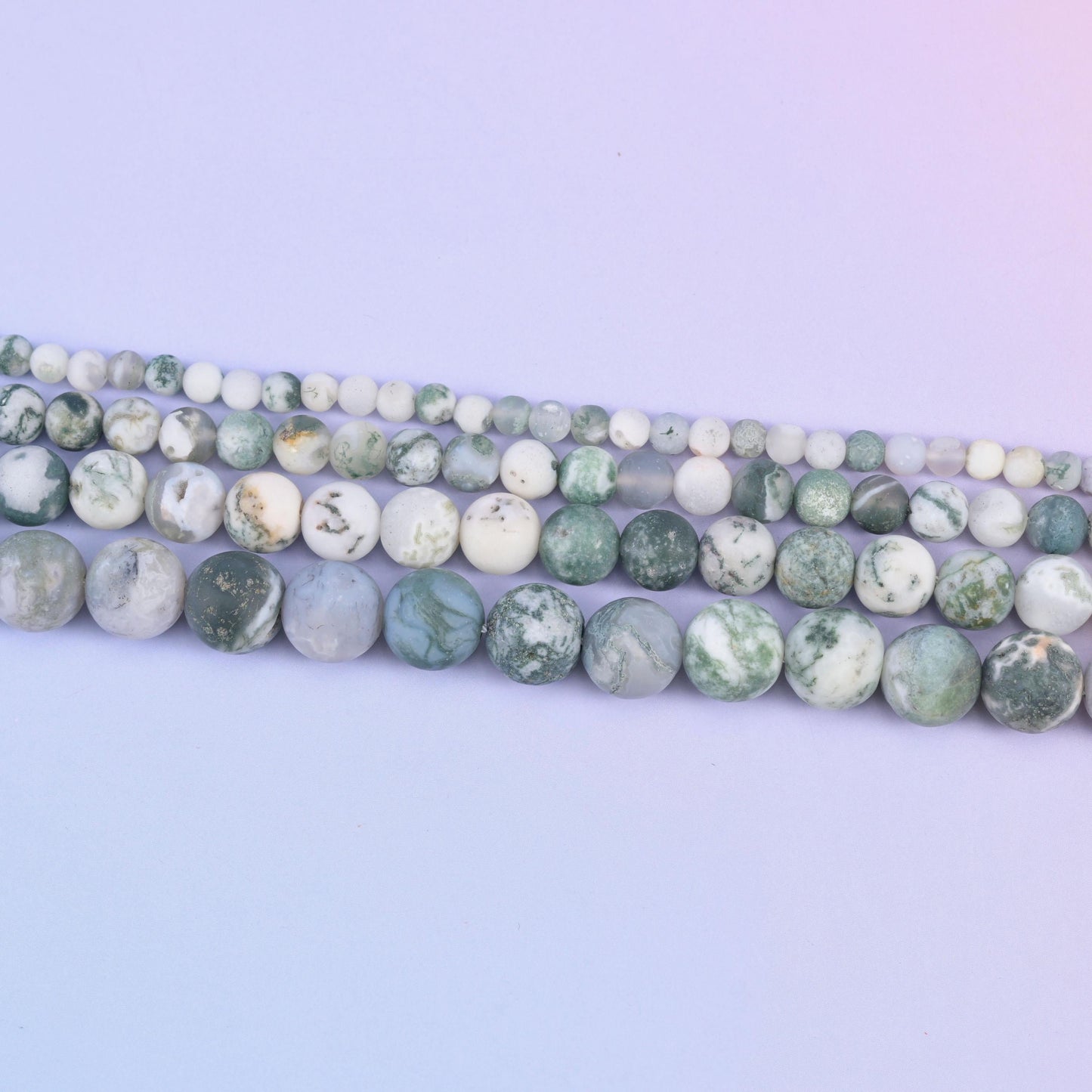 Green tree agate matte round beads in milky white with mossy dark green dendritic markings