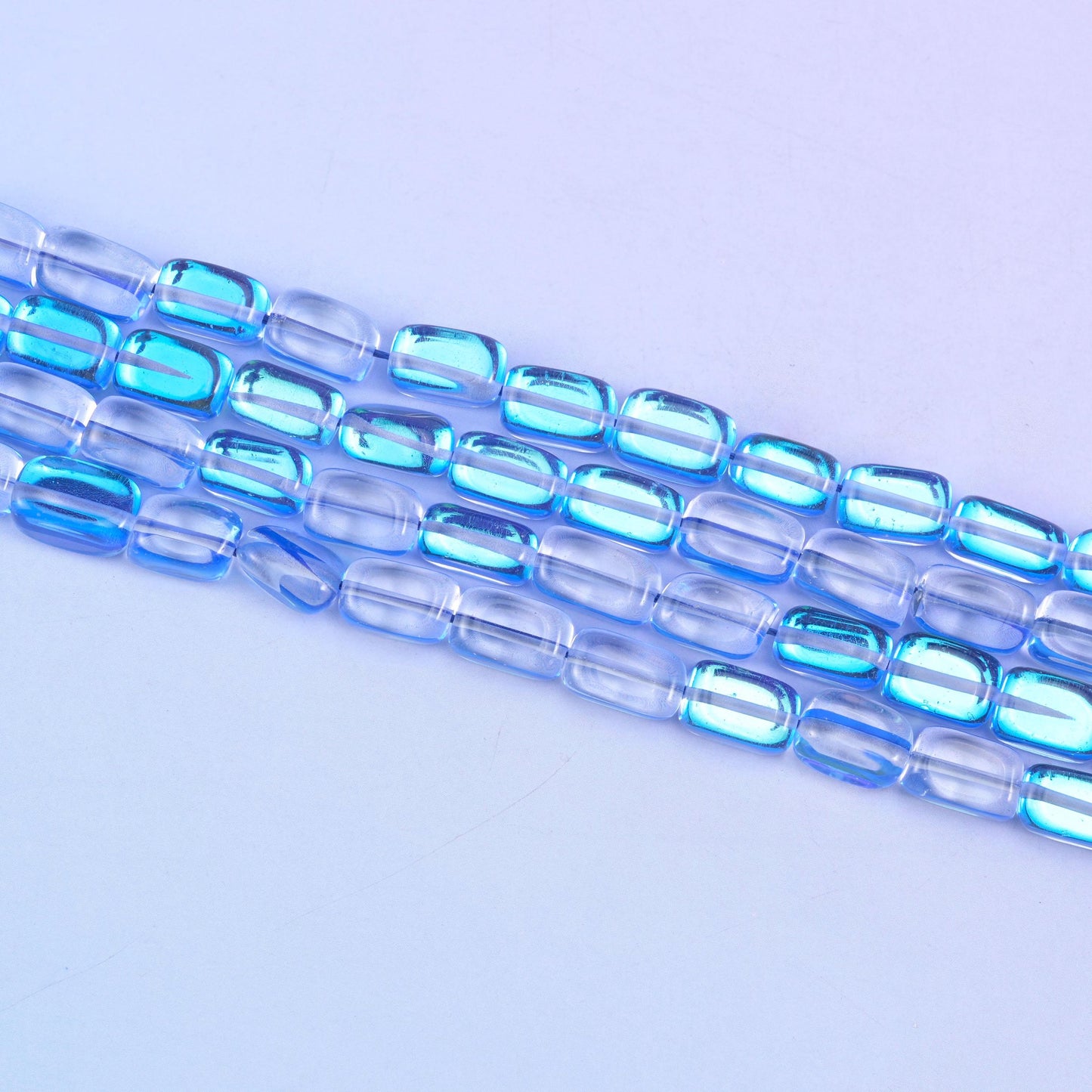 Blue Mystic Aura Rectangle Glass Beads 10-12mm in sapphire blue with an iridescent shimmer