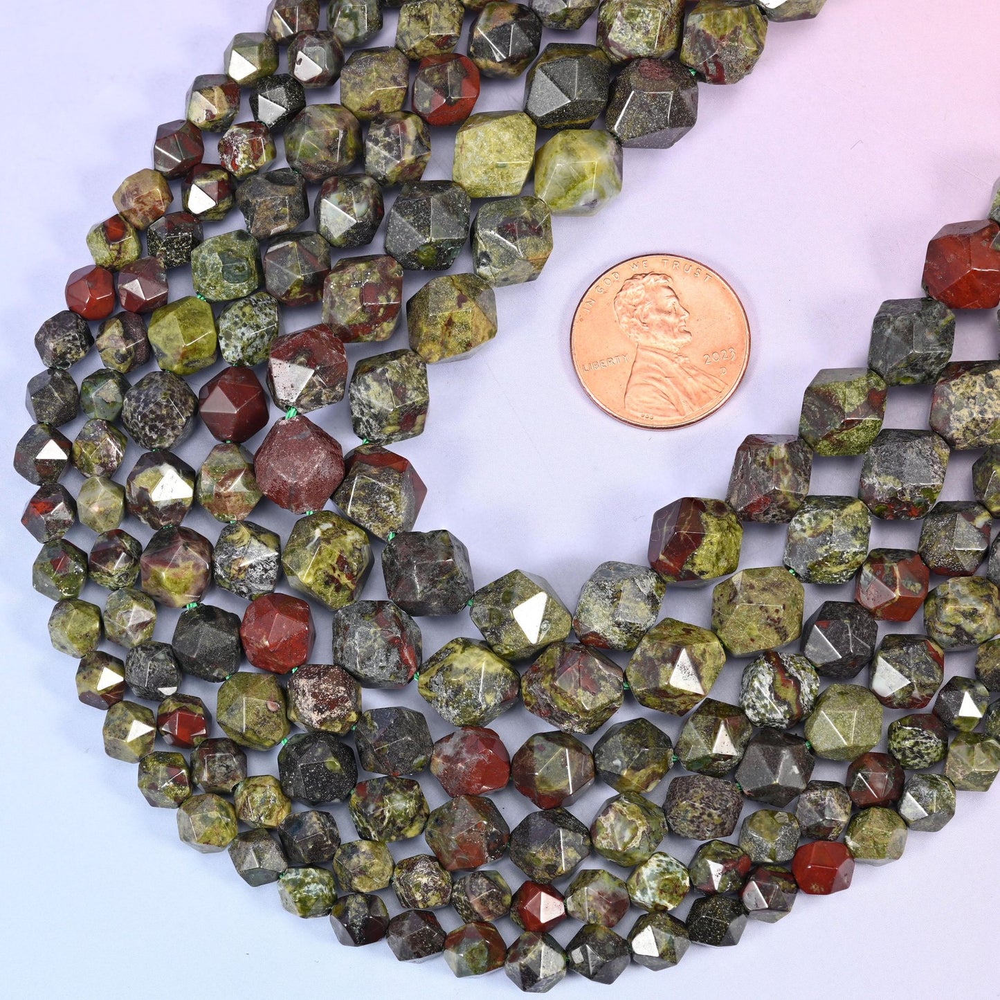 Faceted diamond star cut dragon bloodstone beads