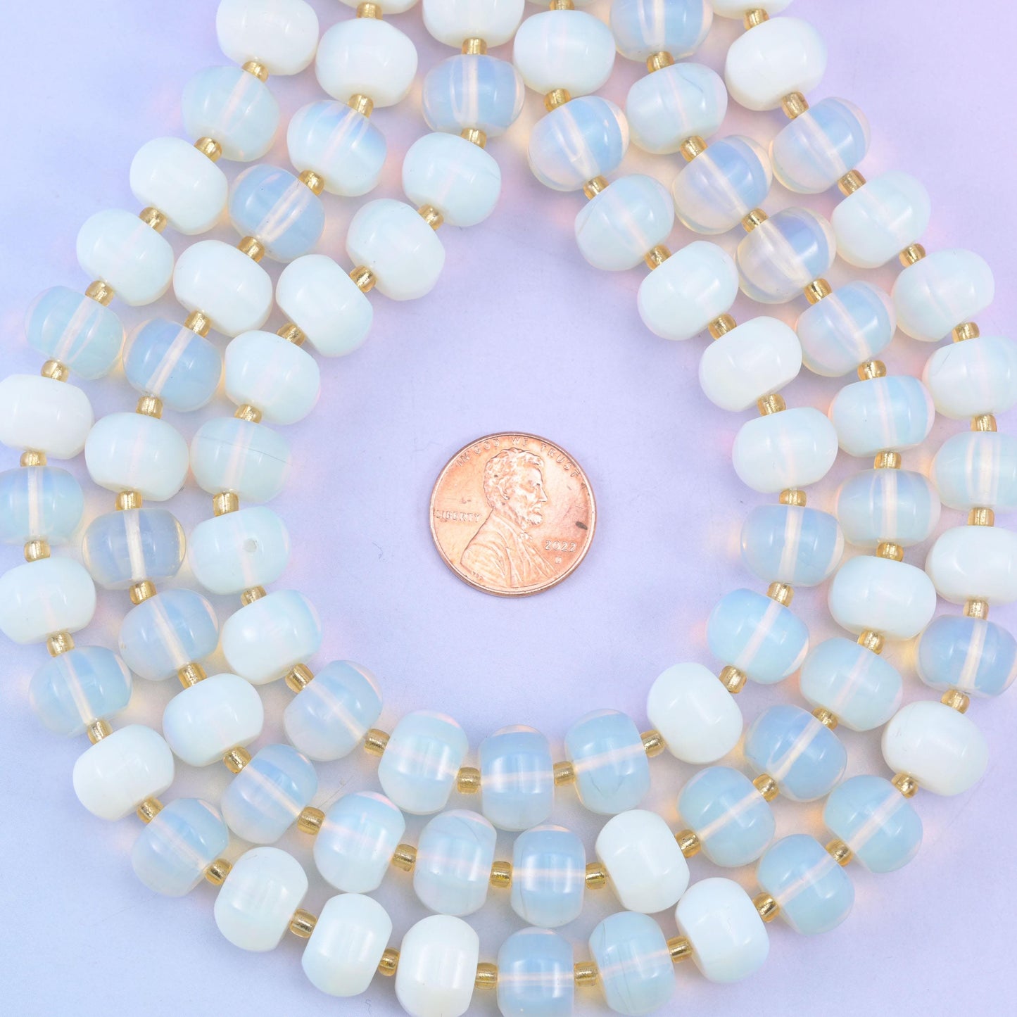 White opalite smooth pumpkin beads, man-made glass with a soft opalescent glow