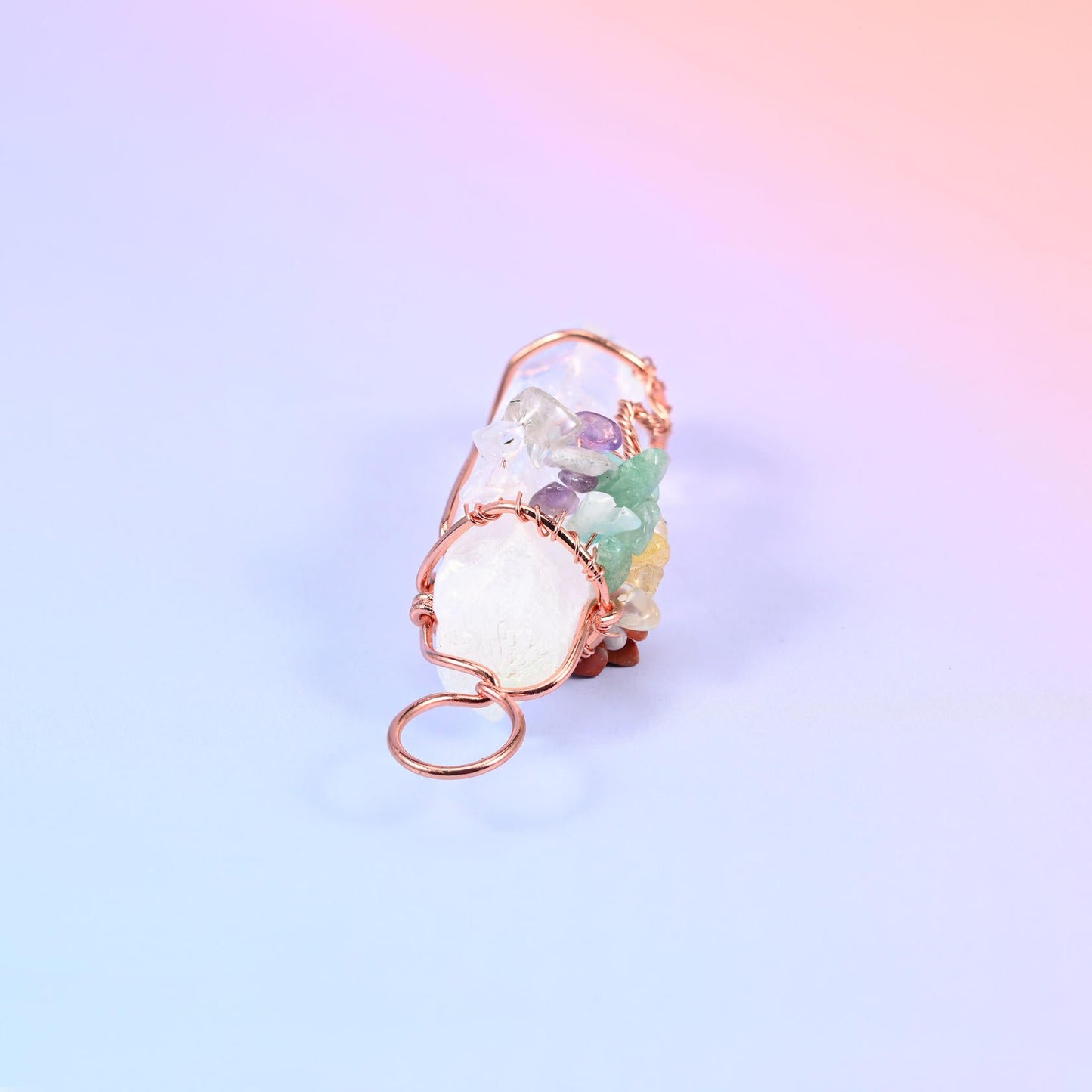 Clear Quartz Single Point Tower Pendant with Copper Wired Tree of Life, a milky-to-clear quartz point cradled in hand-wound copper-toned wire