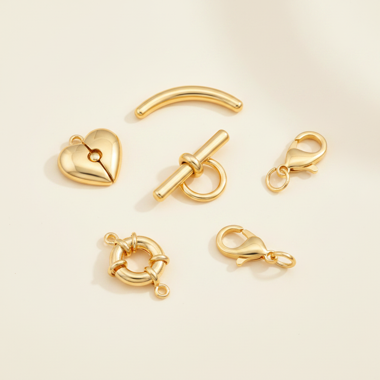 18K gold plated jewelry clasps on warm ivory