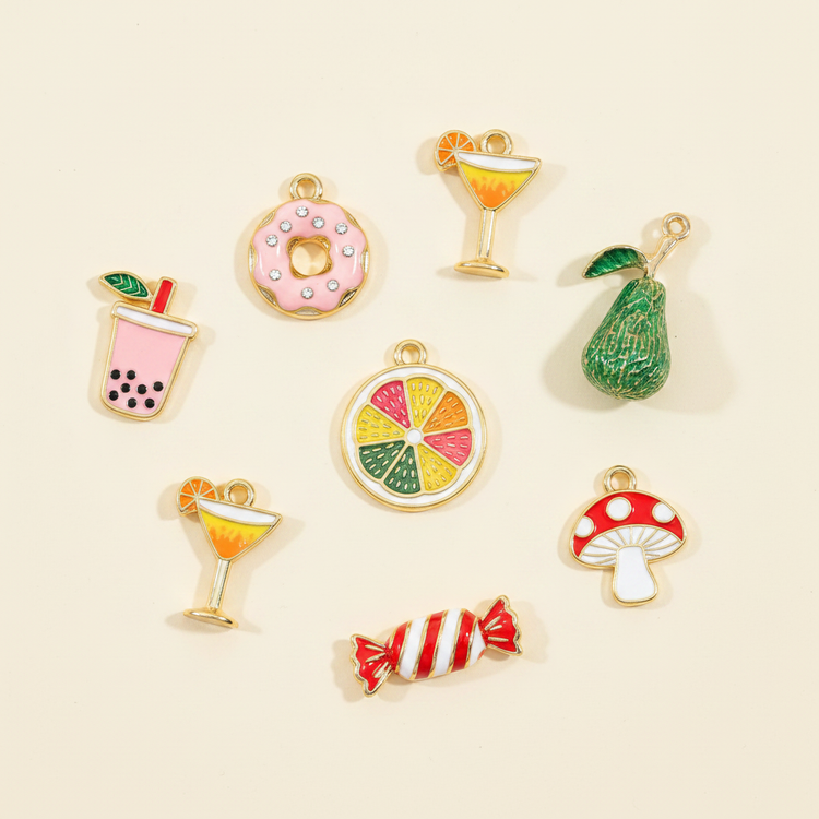 18K gold plated food and drink charms on warm ivory