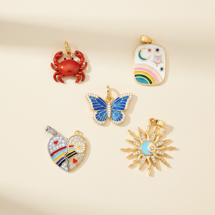 18K gold plated enamel charms on warm ivory