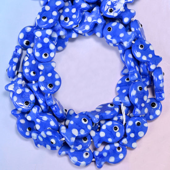 Blue with White Dot Fish glass beads, close view of the coiled strands in royal blue with white spots