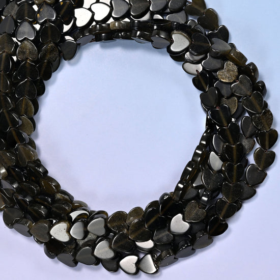 Gold Obsidian flat heart beads, close view of the coiled strands in glossy black with a bronze sheen