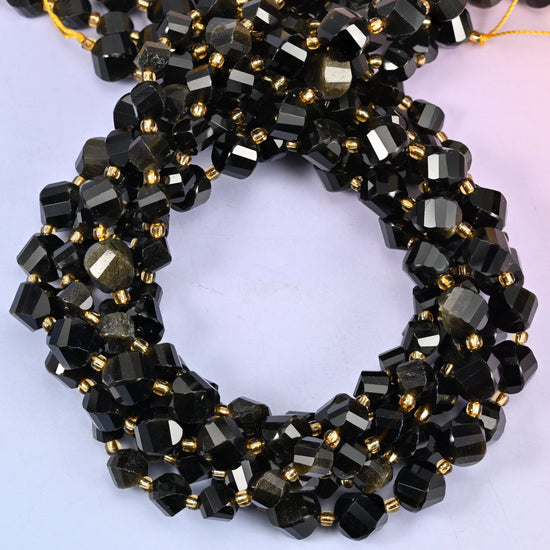 Gold Obsidian faceted spiral twist beads, close view of the coiled strands showing black with a golden sheen