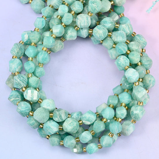 Green Amazonite faceted spiral twist beads, close view of the coiled strands showing sea green with white streaking