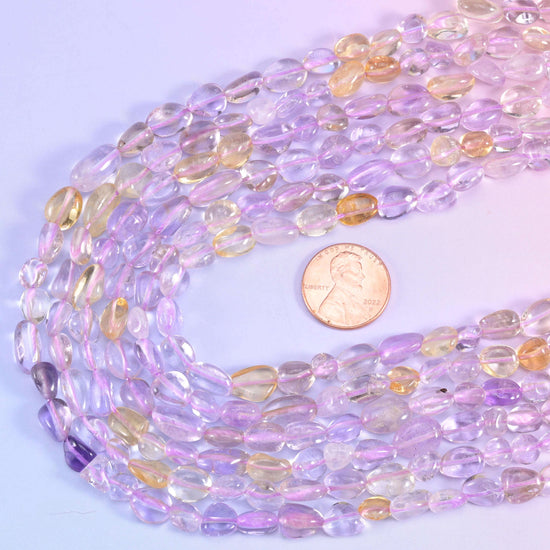 Ametrine pebble nugget gemstone beads.