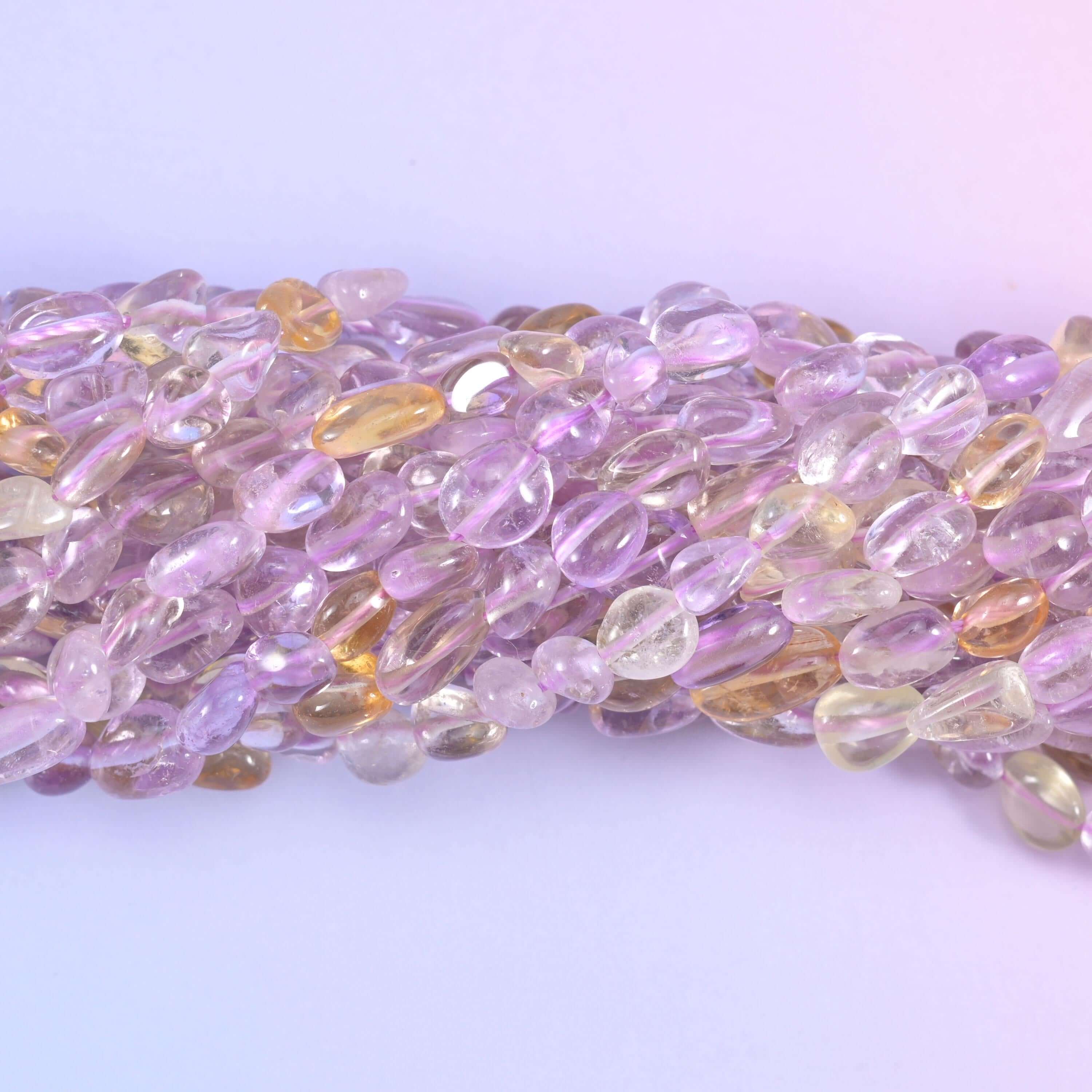 Ametrine pebble nugget gemstone beads.