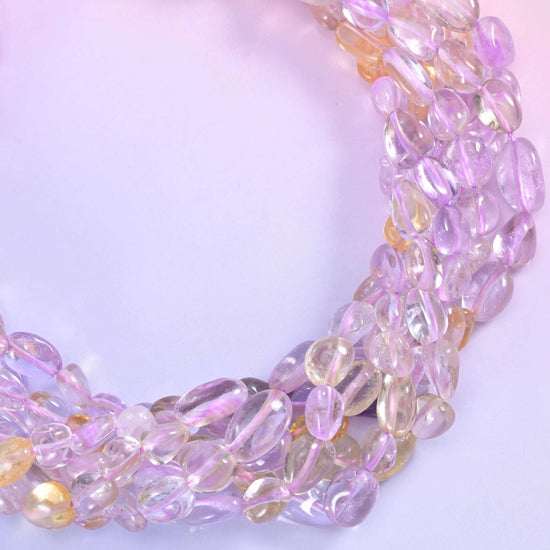 Ametrine pebble nugget gemstone beads.