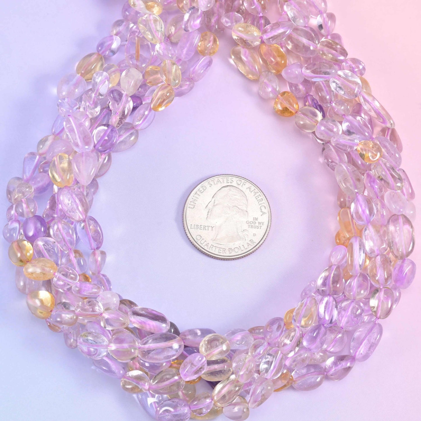 Ametrine pebble nugget gemstone beads.