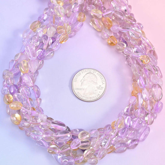 Ametrine pebble nugget gemstone beads.