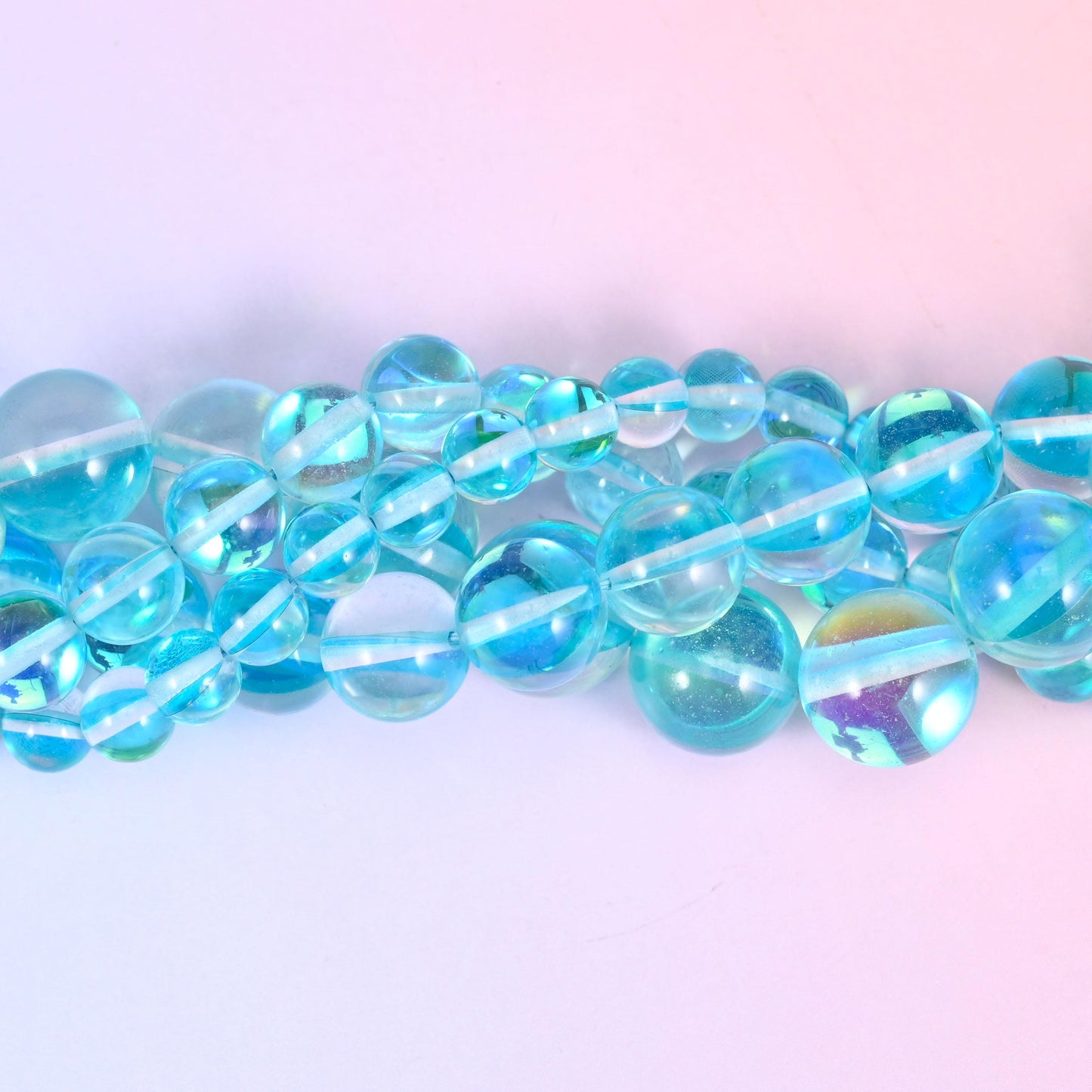 Mystic Aura Light Blue Round Glass Beads: Iridescent Jewelry Making Supply, 15 Inch Strand