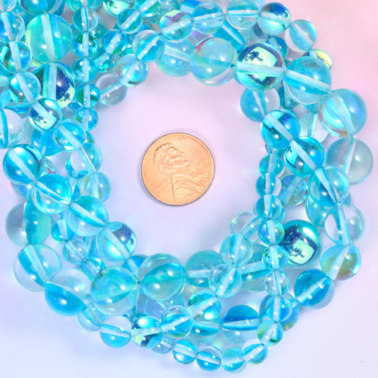 Mystic Aura Light Blue Round Glass Beads: Iridescent Jewelry Making Supply, 15 Inch Strand
